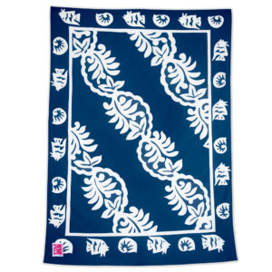 Product image of Woodrose pattern Maui Beach Sheet in a navy blue color.